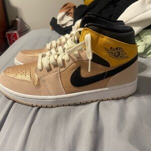 Nike Air Jordan Mid Sneakers in Gold and Black